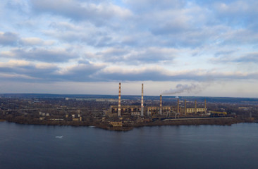 Fototapeta na wymiar aerial view of smoke from the pipes of power plant station