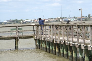 Black Couple Pier Fishing in Texas