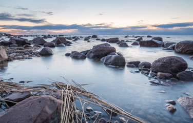 sunset at the seaside with rocks