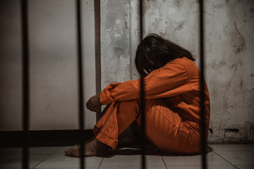 Hands of women desperate to catch the iron prison,prisoner concept,thailand people,Hope to be...