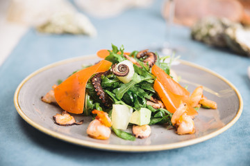 salad with octopus and arugula