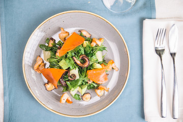 salad with octopus and arugula