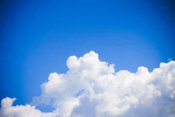 Naklejka na ściany i meble Blue sky background with white clouds - image with copy space