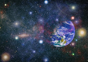 Earth and galaxies in space. Science fiction art. Elements of this image furnished by NASA.