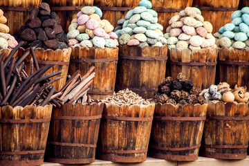 Bags of colorful herbs and spices in the market of Egypt