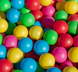 Colored child game balls background. Happy chilehood play concept. High detailed stock photo