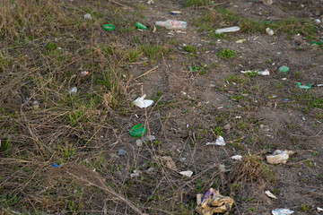 trash lies on the ground. pollution of the planet. ecology problem