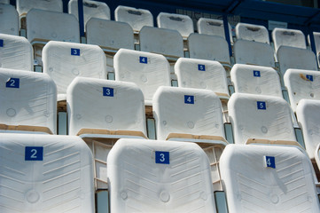 Fototapeta premium Empty white seats in stadium