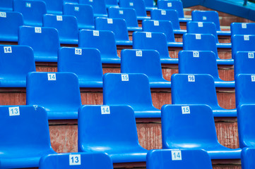 Fototapeta premium Empty blue seats in stadium