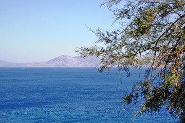 Greek Islands in the Aegean sea. The rocks in the sea. Beautiful scenery. Travel concept.
