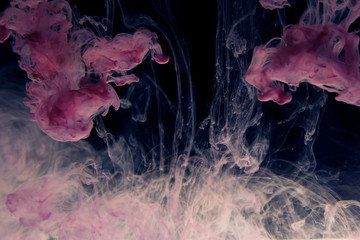 Colored paint in water abstract background art