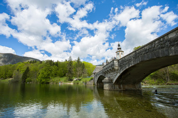 People enjoying beautiful weather in Ukanc, Slovenia, 