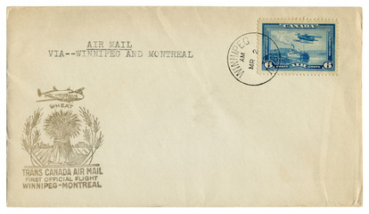 Winnipeg, Montreal, Canada  - 2 March 1939: canadian historical envelope: cover with cachet trans canada air mail first official flight blue postage stamp steamer and hydroplane, six cents, postal can