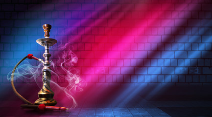 Hookah smoke on a dark abstract background. Background of empty scenes with multicolored neon...