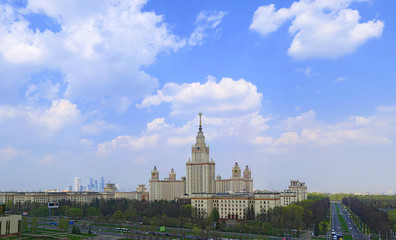 Landscape view of main building of famous Russian university under blue cloudy sky