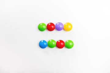 A multicolored mathematical signs made of children's toys