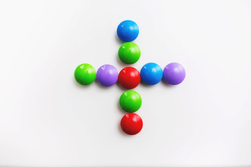 A multicolored mathematical signs made of children's toys