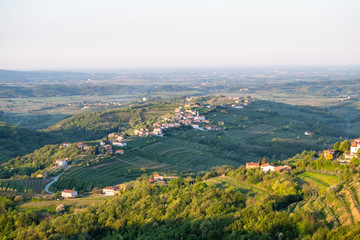 Fototapeta na wymiar Village Kozana between vineyards in wine region Brda in Slovenia