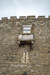 A glass window on the wall of dover castle in uk