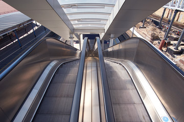 perspective view on escalator on railway station
