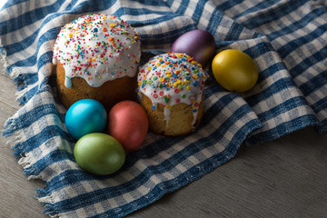 Photo of Easter cake and eggs. Traditional Russian and Ukrainian Easter cake kulich and painted eggs