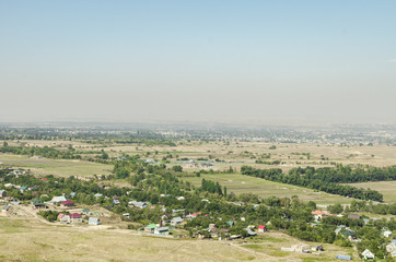 Fototapeta premium Numerous villages and private houses near the city of Almaty in Kazakhstan. Photographed from a bird's-eye view.