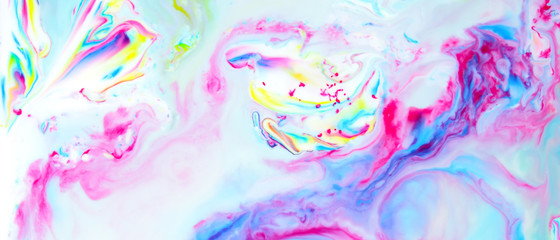 Fluid art. Multicolored abstract background on the liquid. Color pattern in the style of pop art. Multicolored fluid stains. Widescreen