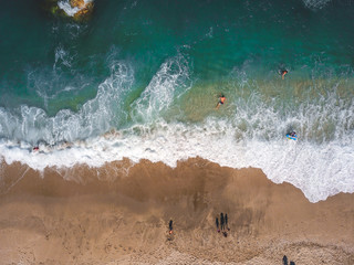 Fototapeta na wymiar Aerial View From Flying Drone Of People Relaxing