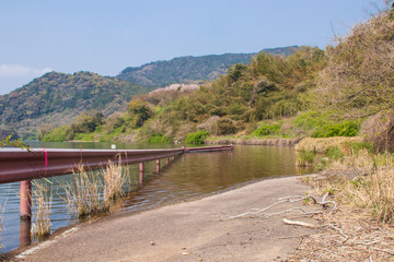 Fototapeta premium 水没したガードレールと廃道 Flooded guardrail and Abandoned road 横竹ダム 佐賀県嬉野市