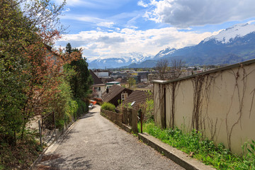 Fototapeta na wymiar City street overlooking the Alps. Vaduz, Liechtenstein.
