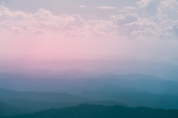 Mountains under amazing colorful sunrise sky