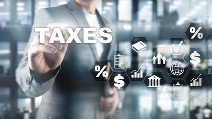 Fototapeta na wymiar Concept of taxes paid by individuals and corporations such as vat, income and wealth tax. Tax payment. State taxes. Calculation tax return