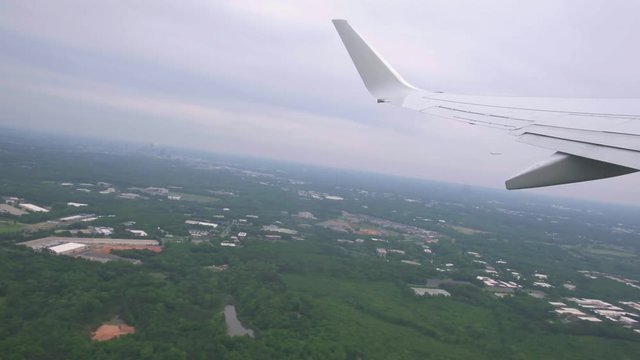 Looking out of the airplane window during takeoff. Flat plane