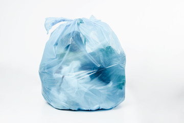 Plastic bottles in a blue garbage bag. Concept of caring for the environment, recycling. Secondary plastic circuit. Environment pollution.