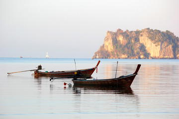 fishing boat in the sea with beautiful sky background