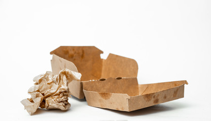 Empty cardboard box after eating. The concept of garbage disposal and segregation. Ecological,...