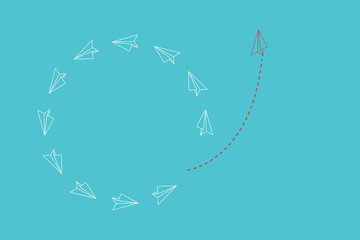 Think different. Think differently concept. Red airplane changing direction. New idea, change, trend, courage, creative solution, innovation and unique way concept.	