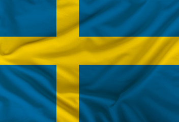 Swedish colored flag depicted on silk fabric with soft folds
