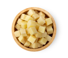 ginger slice in wood bowl isolated on white background. top view