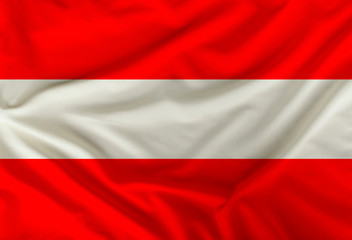 the color flag of the state of Austria depicted on textiles with soft folds