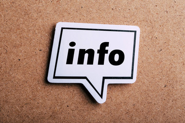 Info Speech Bubble Isolated On Brown paper Background