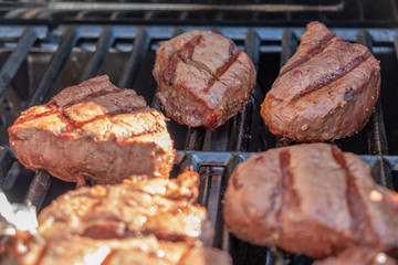 Filet Mignon steaks cooking on grill
