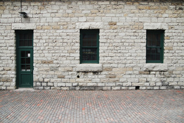 Windows on the brick wall.