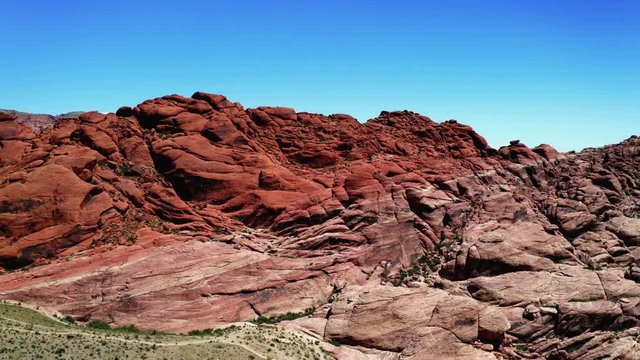 Aerial scenic view of rock formations at Red Rock Canyon National Conservation Area in Nevada, USA. Calica, touristic place with natural scenery near Las Vegas city.