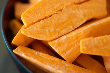 Slices of Raw Fresh Sweet Potatoes ready to cook