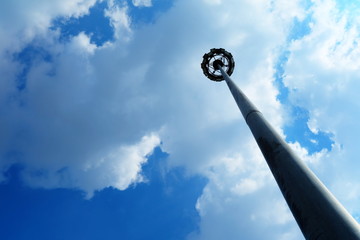 Spotlight Tower Pole in Cloudy Day.