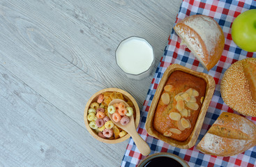 Breakfast table with cereals, coffee and White bread