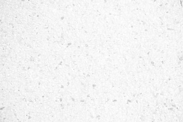 White Grunge Little Pebbles Wall Background.