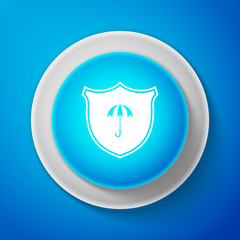 Waterproof icon isolated on blue background. Shield and umbrella. Water protection sign. Water resistant symbol. Circle blue button. Vector Illustration