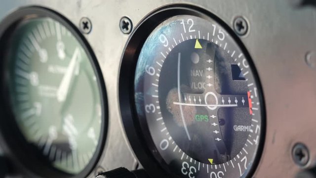 Instrument dials in aircraft cockpit - close up
